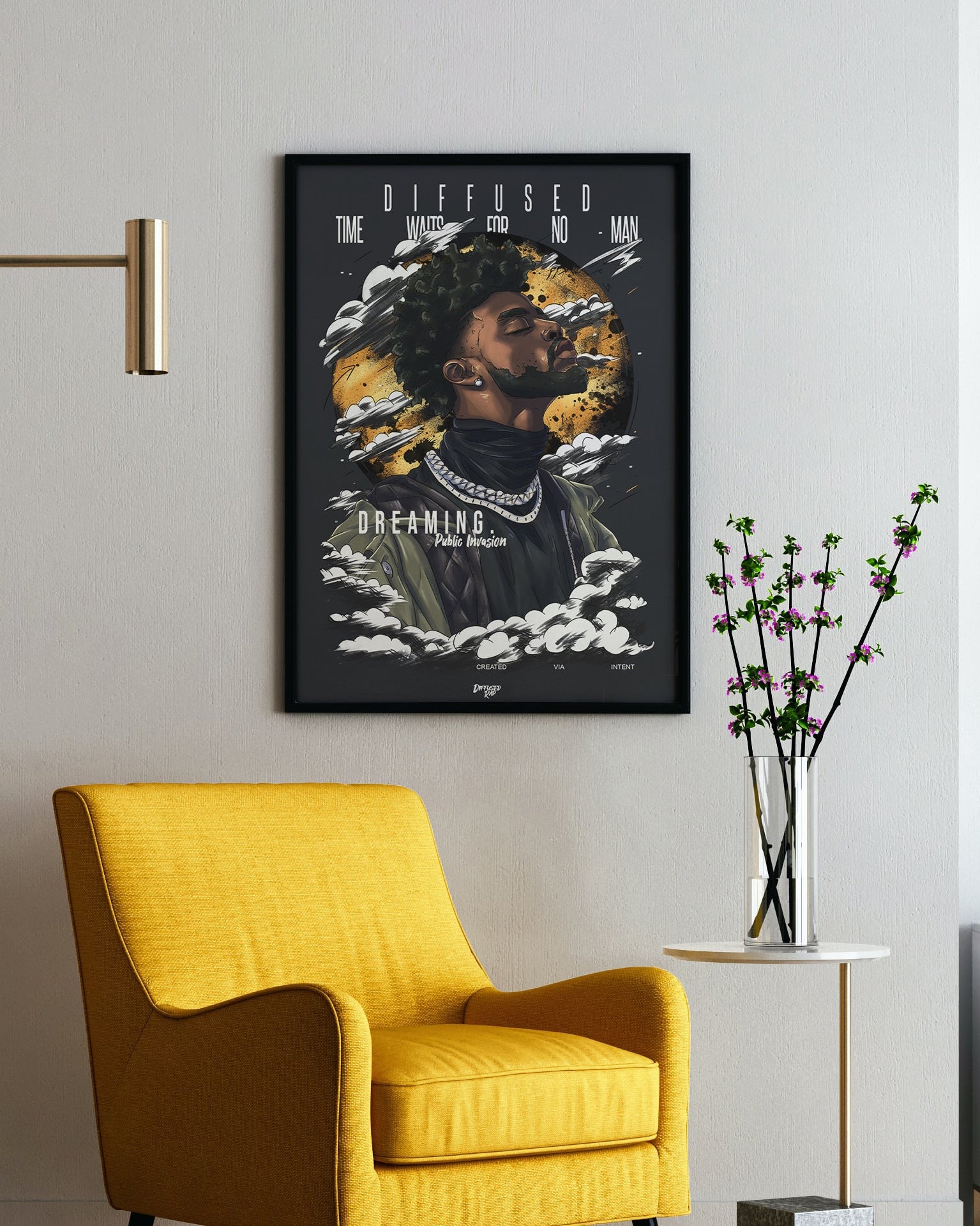 A framed wall art print featuring a stylized portrait with the words 'DIFFUSED' and 'DREAMING' hanging above a yellow armchair in a modern room setting.
